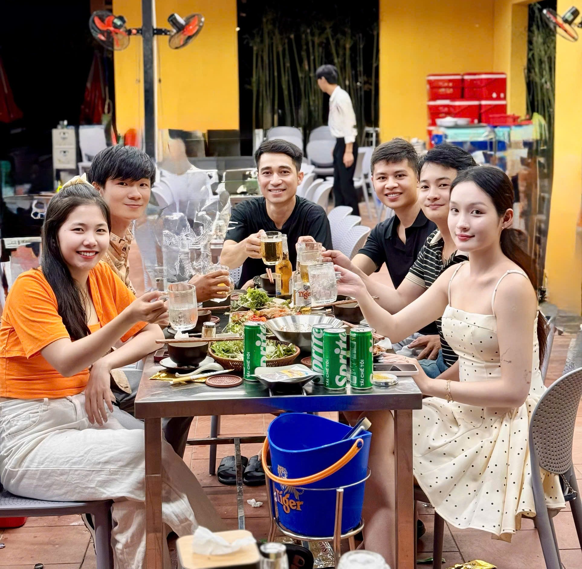 Customers enjoying a seafood feast at Kim Seafood restaurant