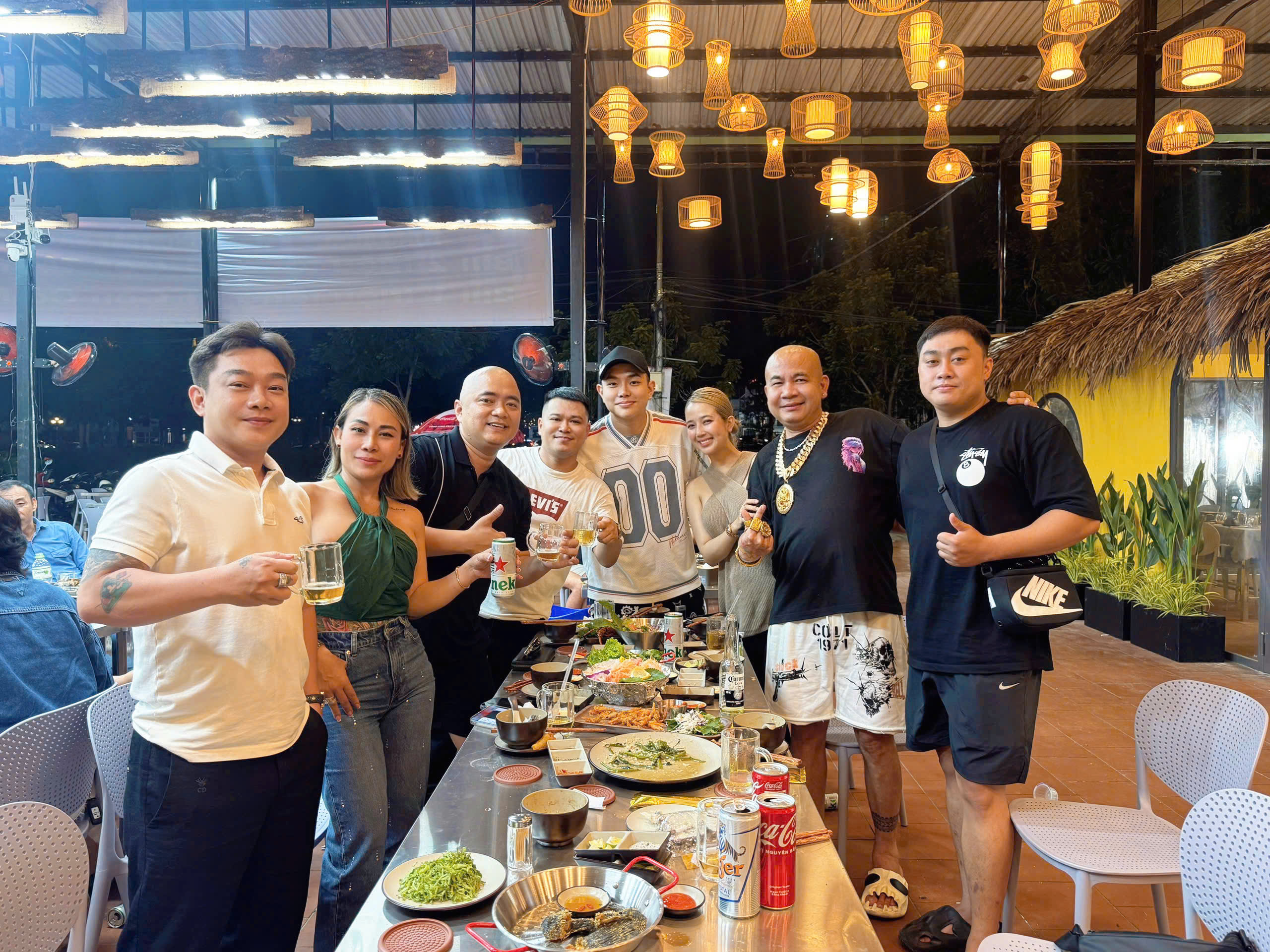 Customers enjoy dining and experiencing the ambiance at Kim Seafood restaurant.